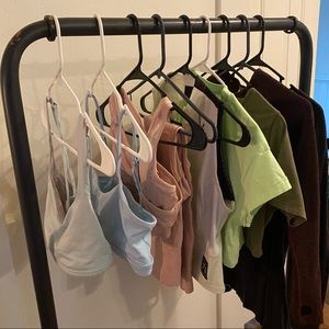 Lot of Lululemon, Gymshark, & Ryderwear workout tops. Size small & medium